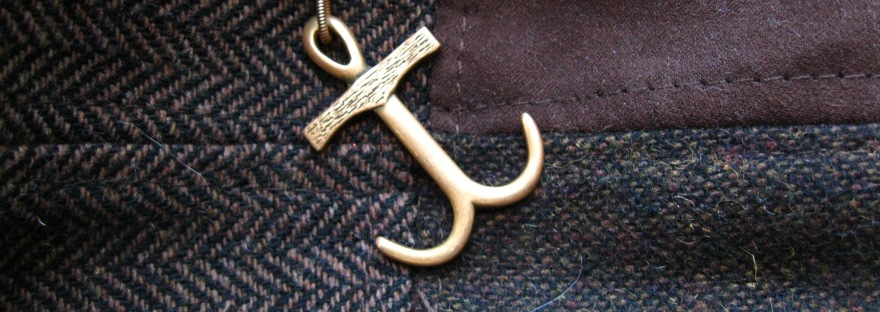 anchor pendant on hat-top